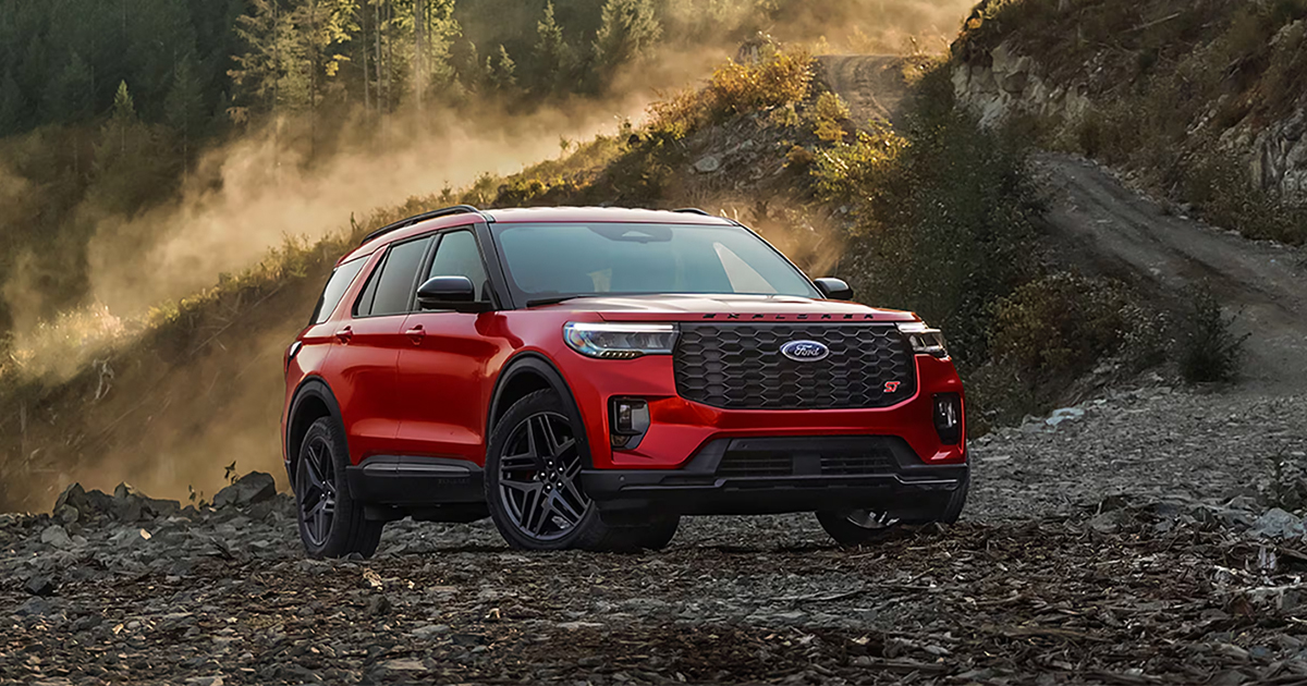 A Ford Explorer parked off-road on rocky terrain.